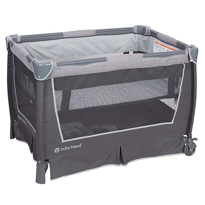 Baby Trend Nursery Center Travel Crib with Removable Rock-A-Bye Bassinet, Changing Table, Organizer, and Electronic Music Center and Nightlight, Robin-CubbioJoy
