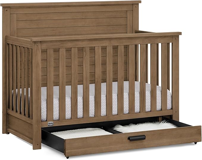 Delta Children Simmons Kids Caden 6-in-1 Convertible Crib with Trundle Drawer, Greenguard Gold Certified, Aged Oak-CubbioJoy