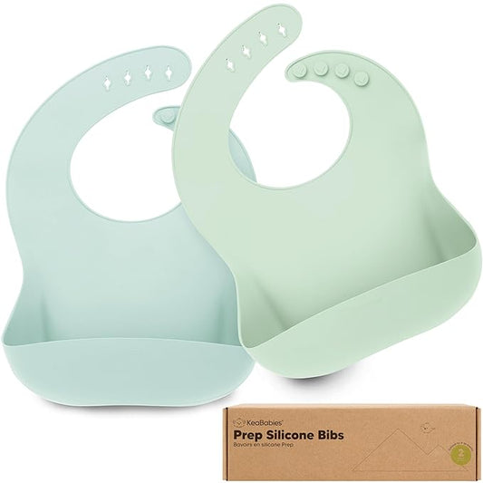 KeaBabies 2-Pack Silicone Baby Bibs for Eating - Sturdy Food-Grade Silicone Bibs for Babies Girl, Boy, Large Food Catcher, Clean & Put On Easily, Waterproof Toddler Feeding Essentials(Pastel Sky)-CubbioJoy