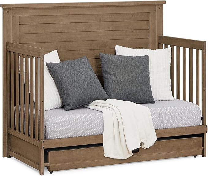 Delta Children Simmons Kids Caden 6-in-1 Convertible Crib with Trundle Drawer, Greenguard Gold Certified, Aged Oak-CubbioJoy