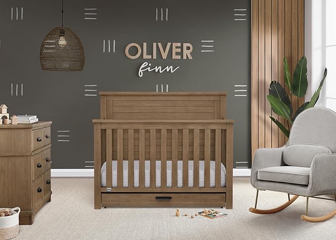 Delta Children Simmons Kids Caden 6-in-1 Convertible Crib with Trundle Drawer, Greenguard Gold Certified, Aged Oak-CubbioJoy