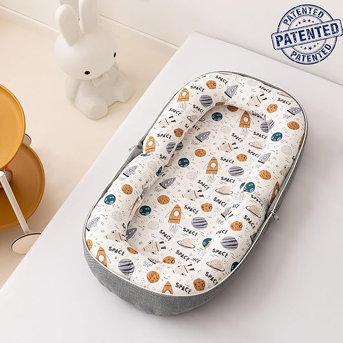 Baby Lounger, Foldable Infant Nest with Soft Memory Foam Mat, Cover with Adorable Pattern, Converts to Backpack for Easy Travel, 0-12 Months, Rocket-CubbioJoy